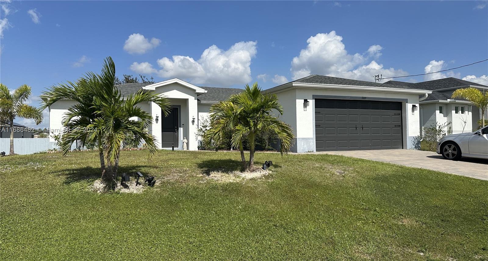 a house with a yard in front of it