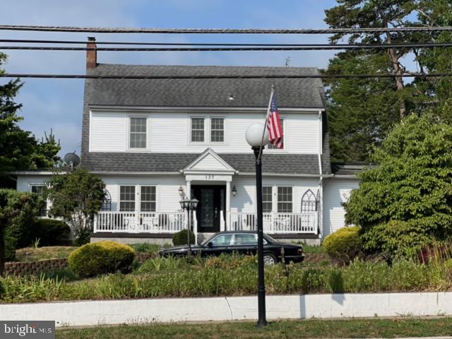 a front view of a house with porch