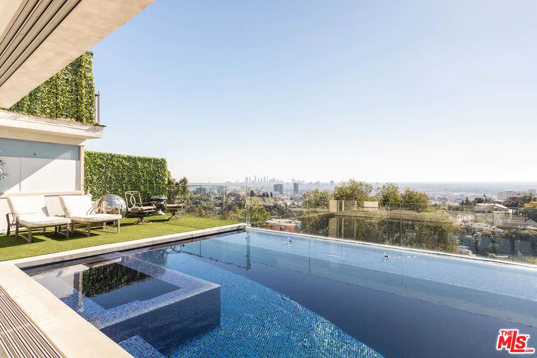 a view of swimming pool from a terrace