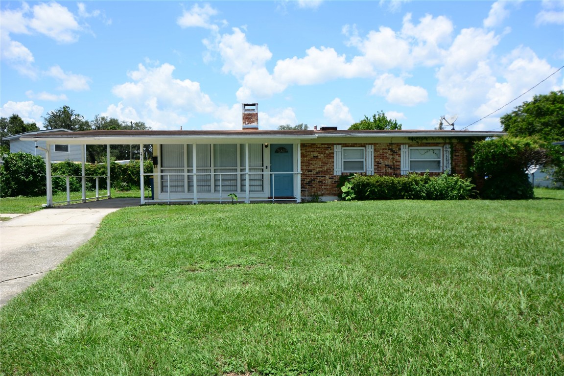 front view of a house with a yard