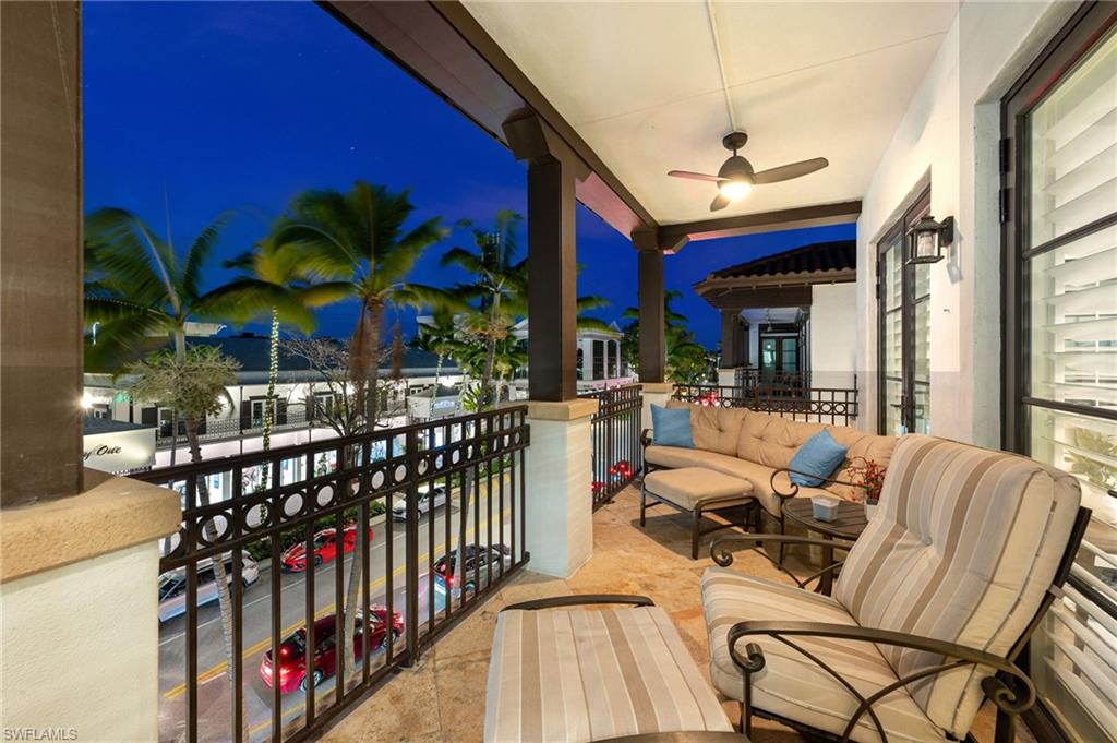 a view of a chairs and tables in patio