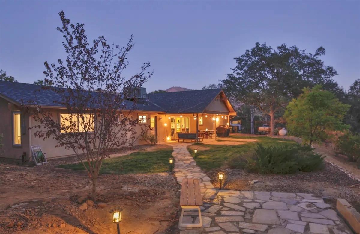 a view of a back yard of the house