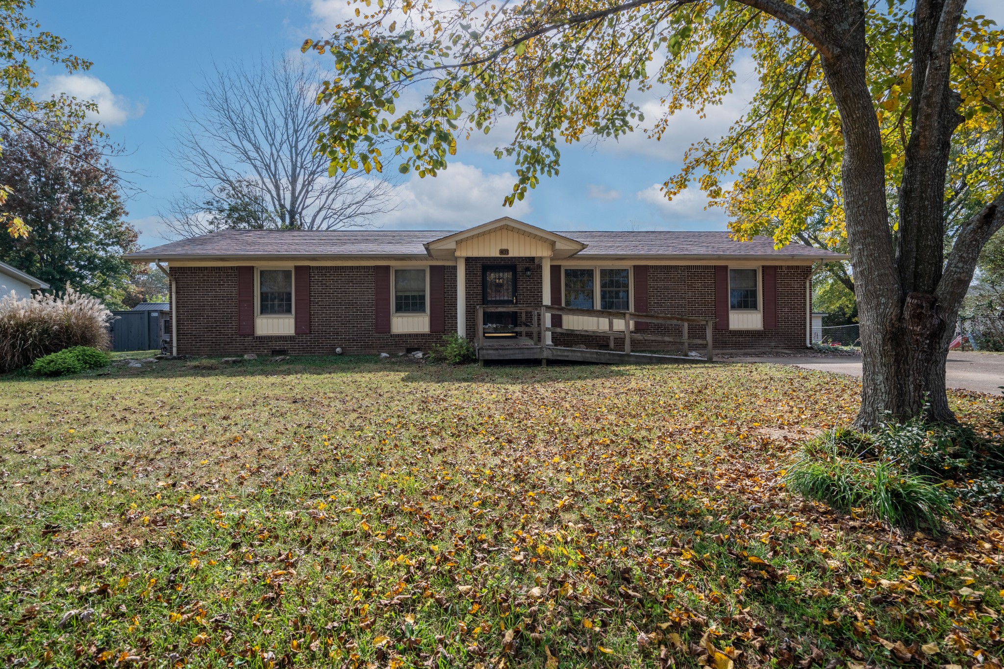 front view of a house with a yard