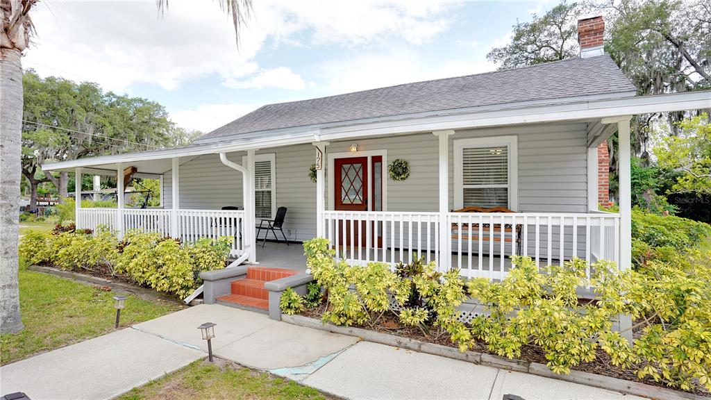 front view of a house with a garden