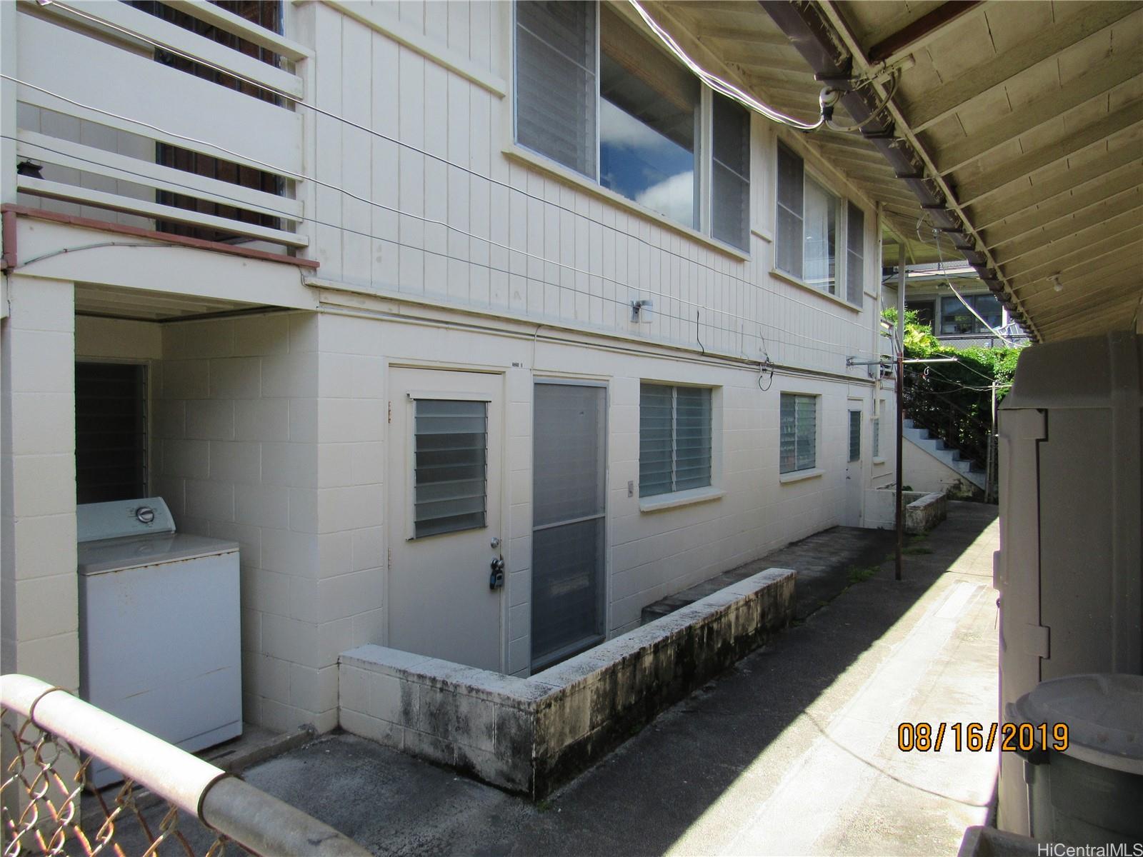 a view of a house with a large window