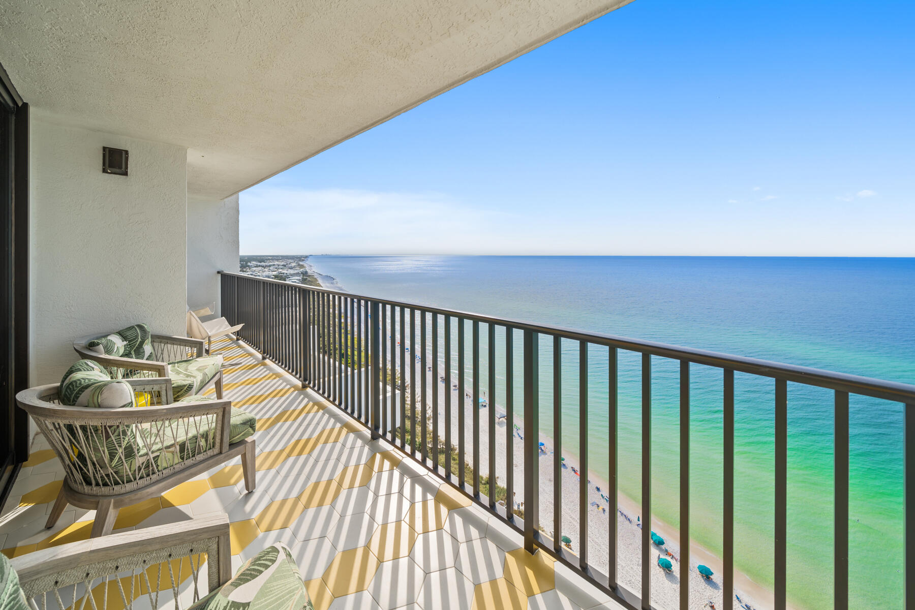 a view of balcony with furniture