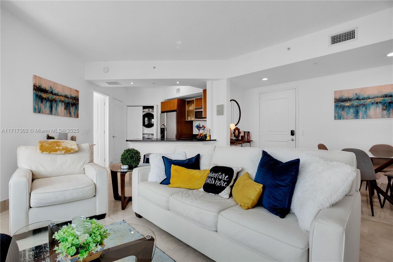 a living room with furniture and a couch