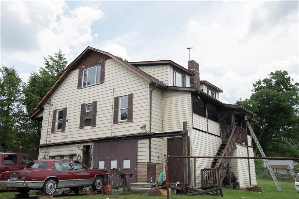 a front view of a house with a porch