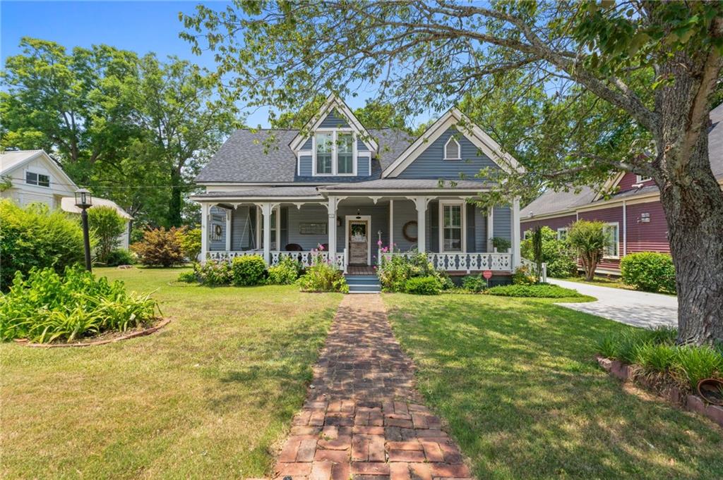 front view of a house with a yard