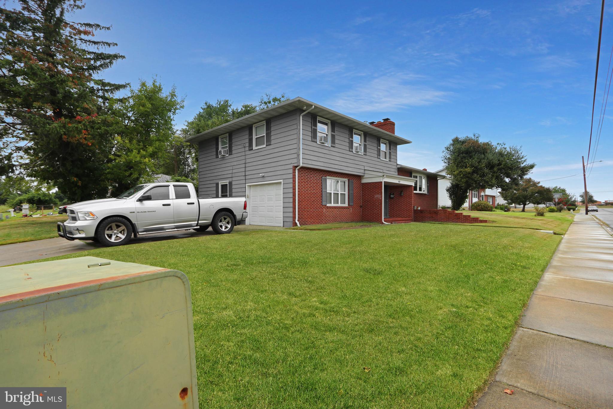 a house view with a garden space