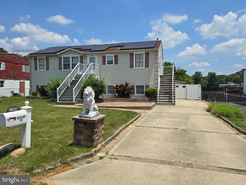 a house view with a garden space