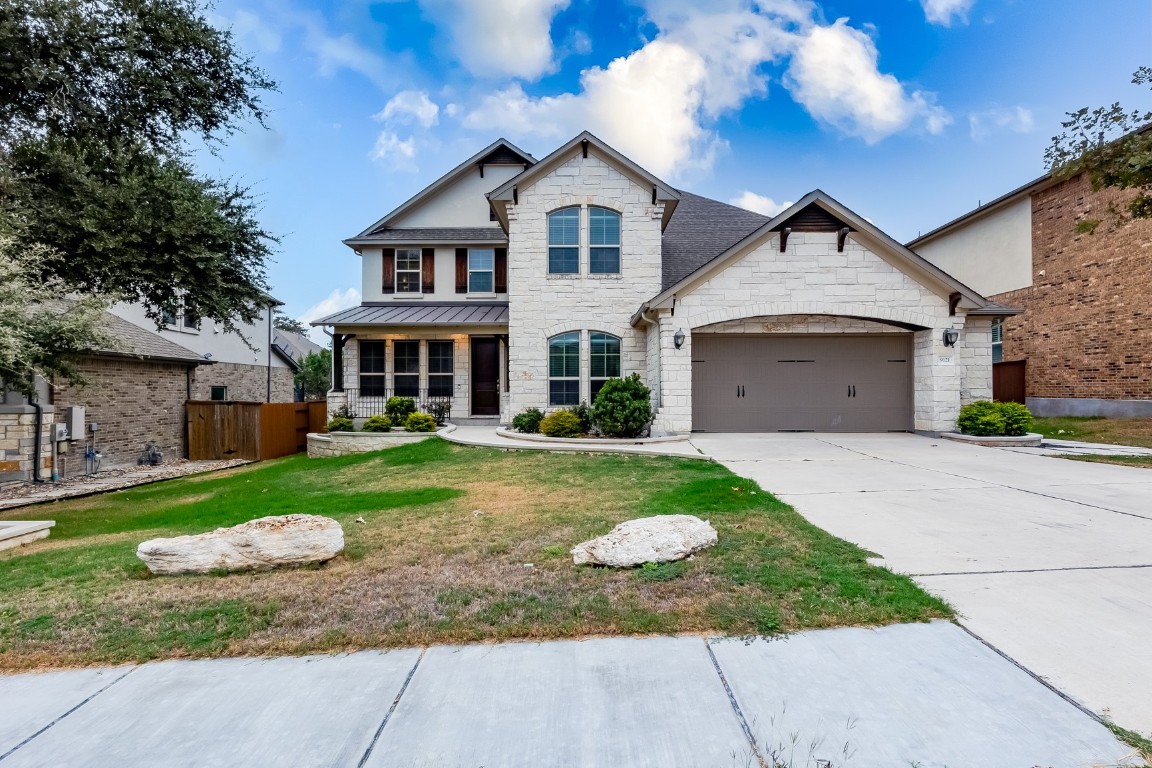 front view of a house with a yard