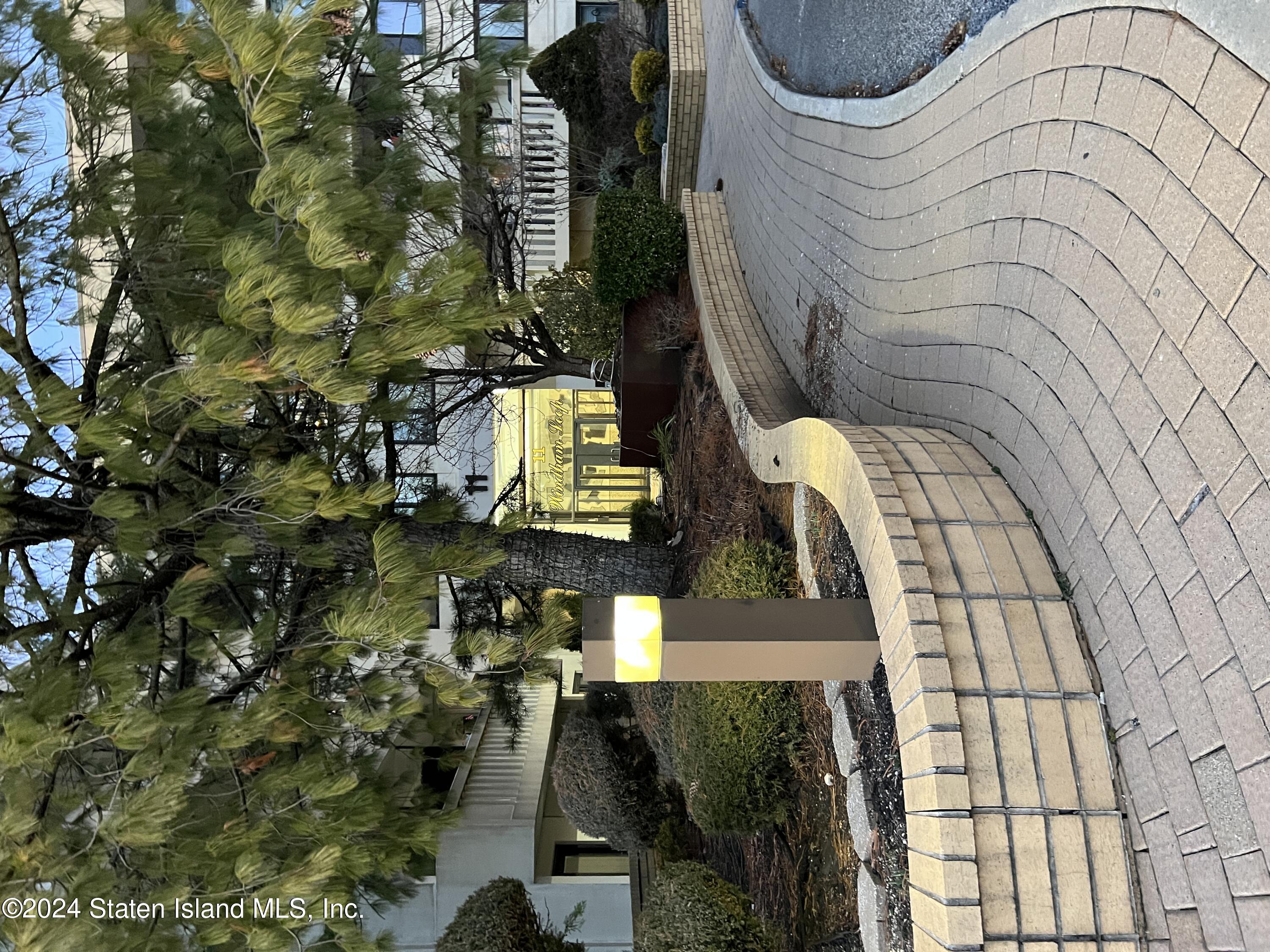 a view of outdoor space building and potted plants