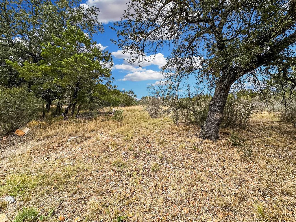 Picture your future home nestled in this serene 0.37-acre cul-de-sac lot, where tranquility and privacy meet the natural beauty of the Texas Hill Country.