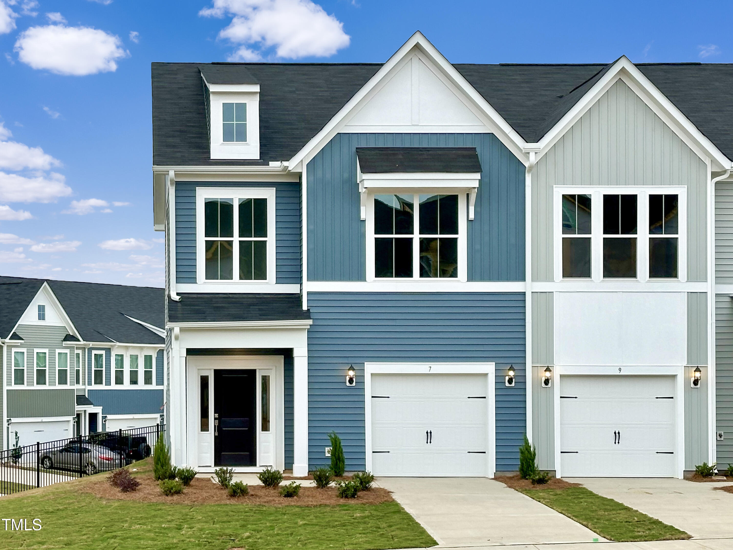 a front view of a house with yard