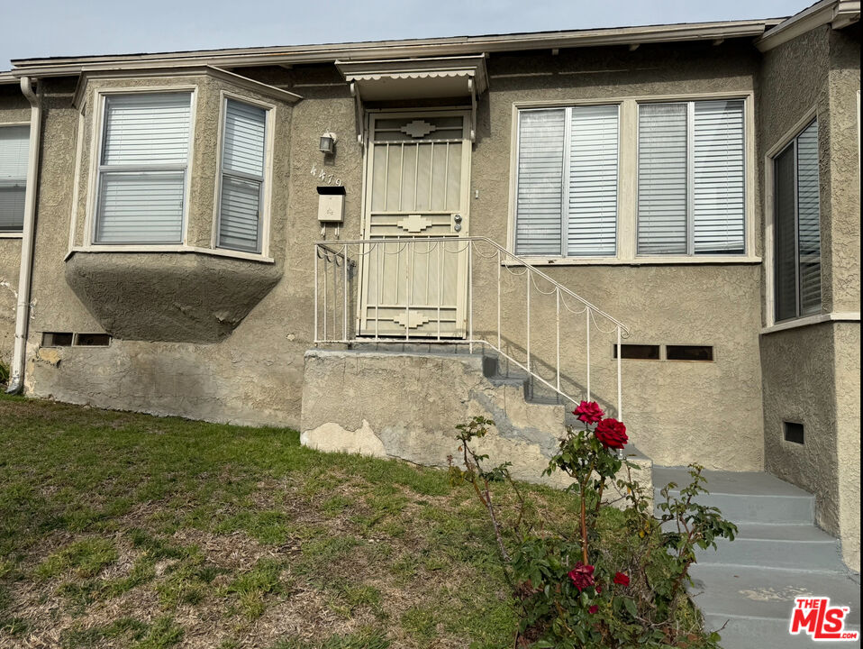 a front view of a house with a porch