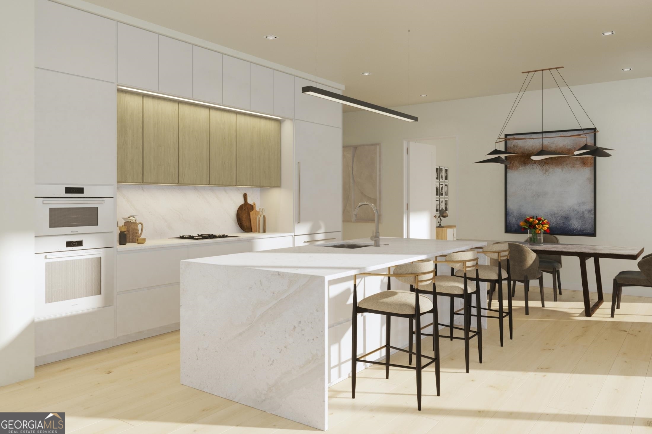 a kitchen with a sink and chairs