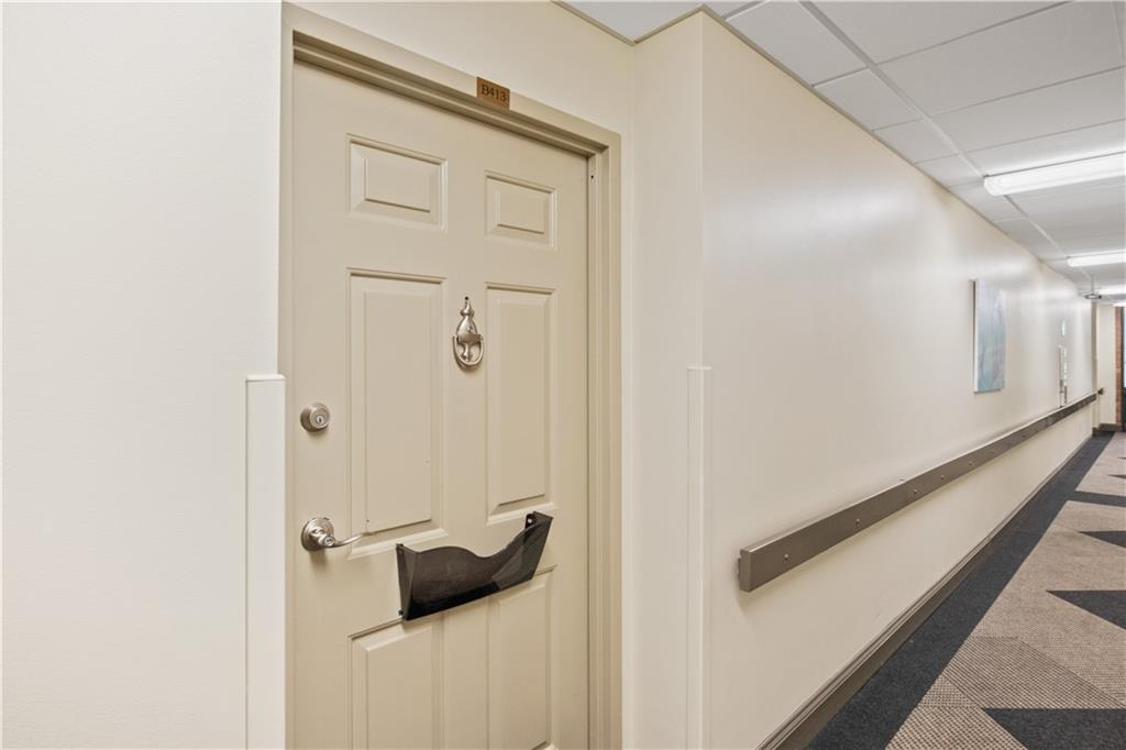 a view of a hallway with the back door