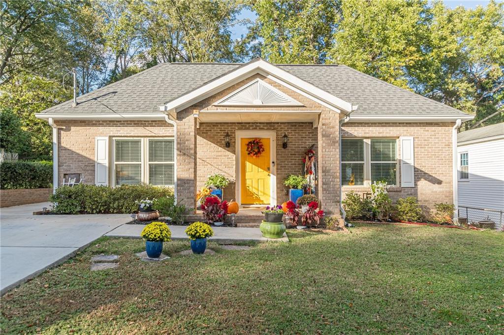 a front view of house with outdoor seating