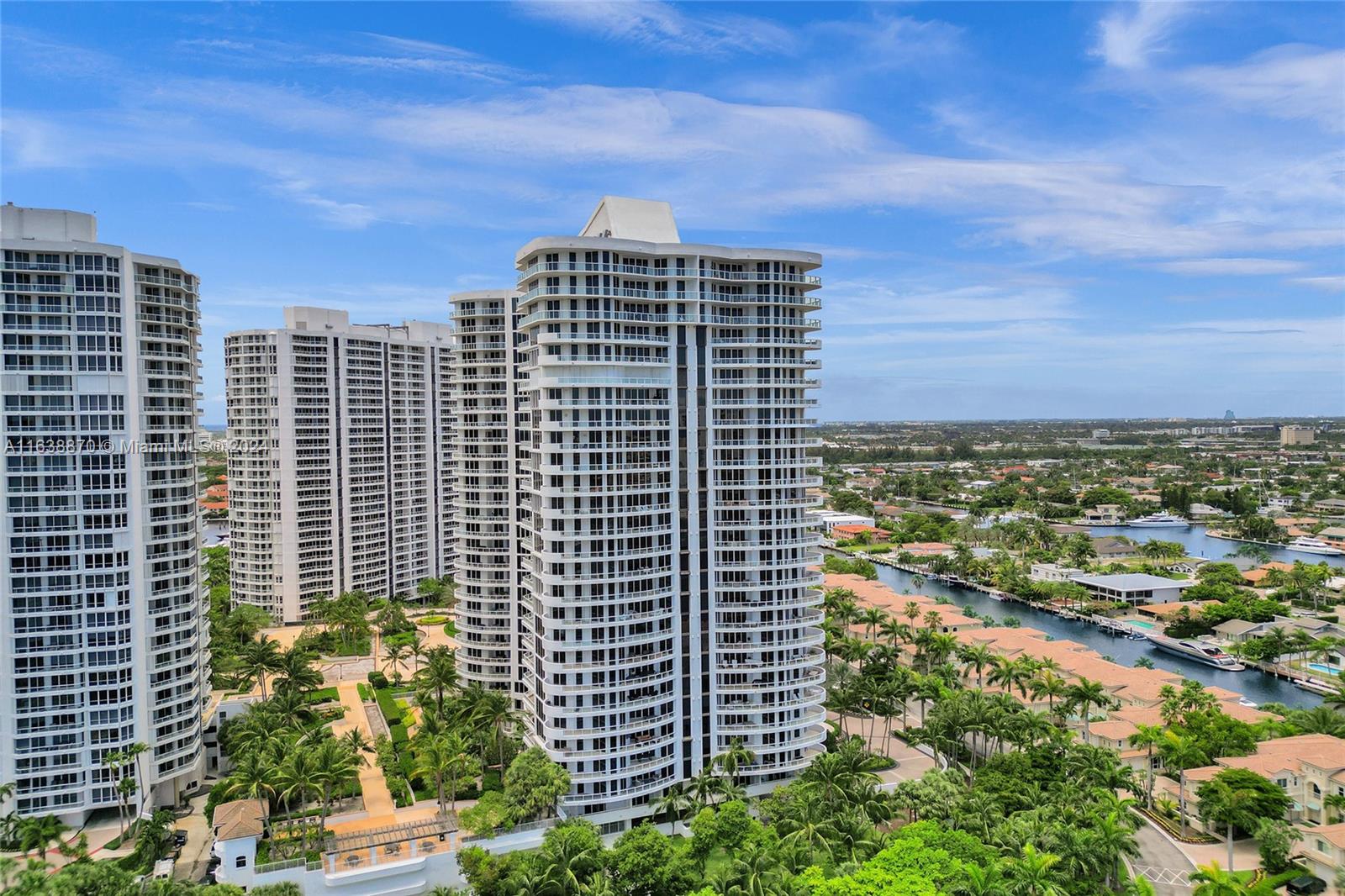 a view of a city with tall buildings