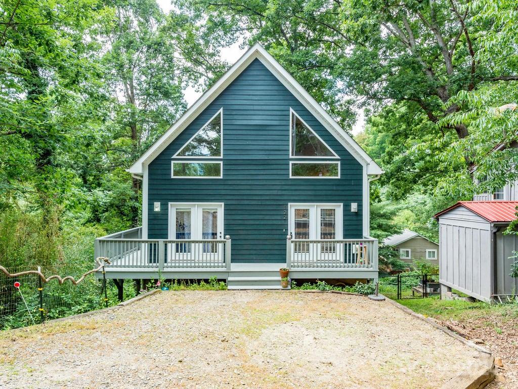 a house with trees in the background