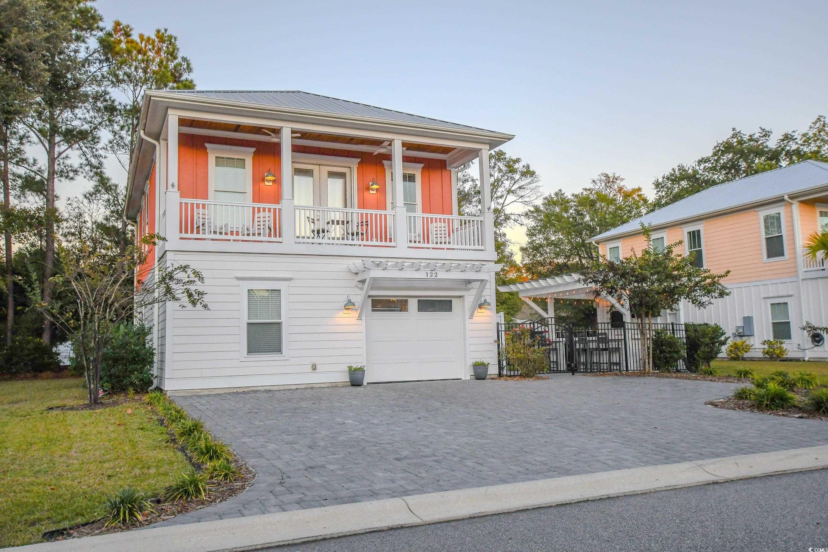 View of front of property featuring french doors,