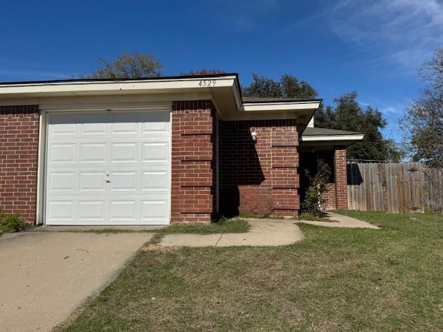 a front view of a house with a garage