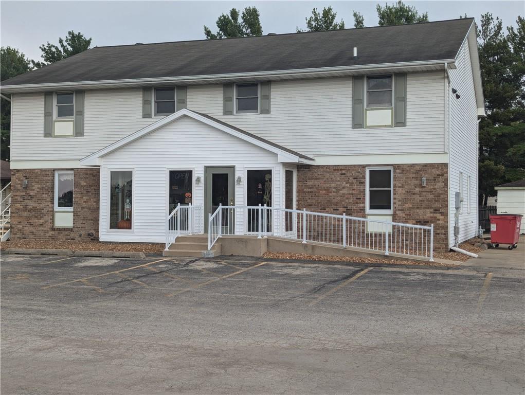 a front view of a house with a garage