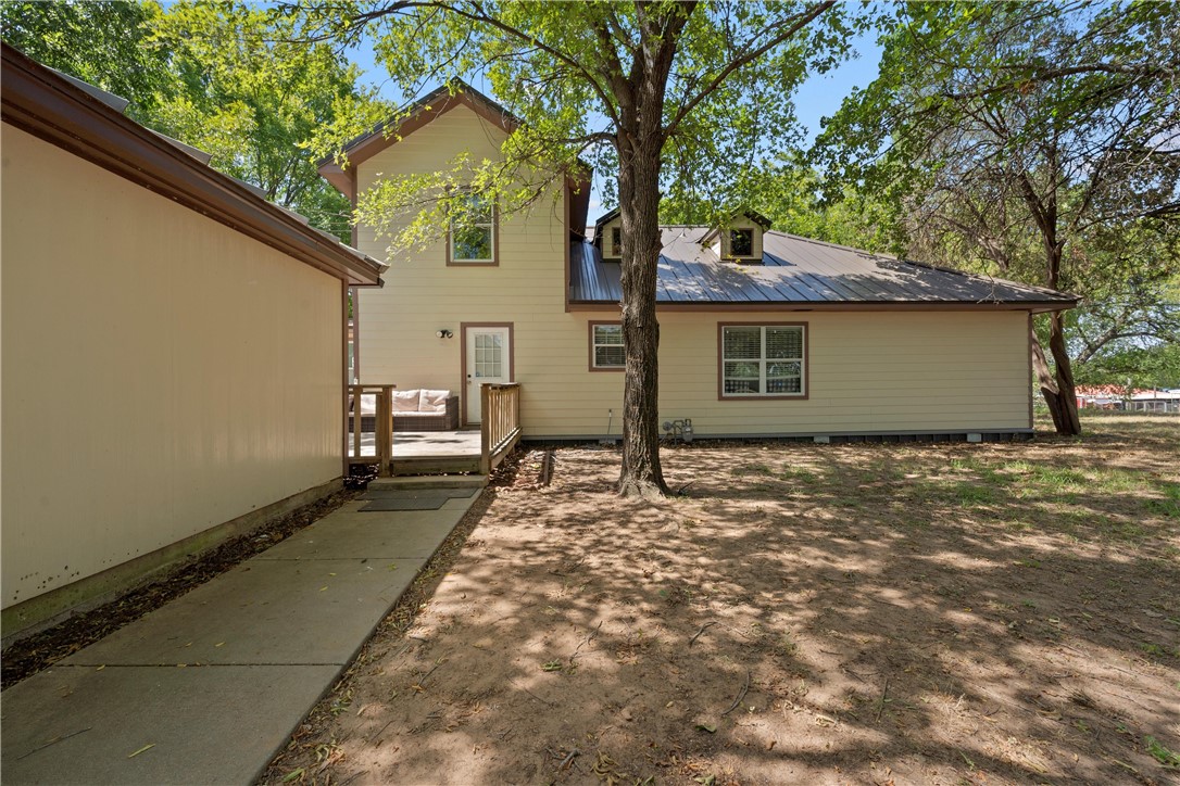 a house with trees in front of it