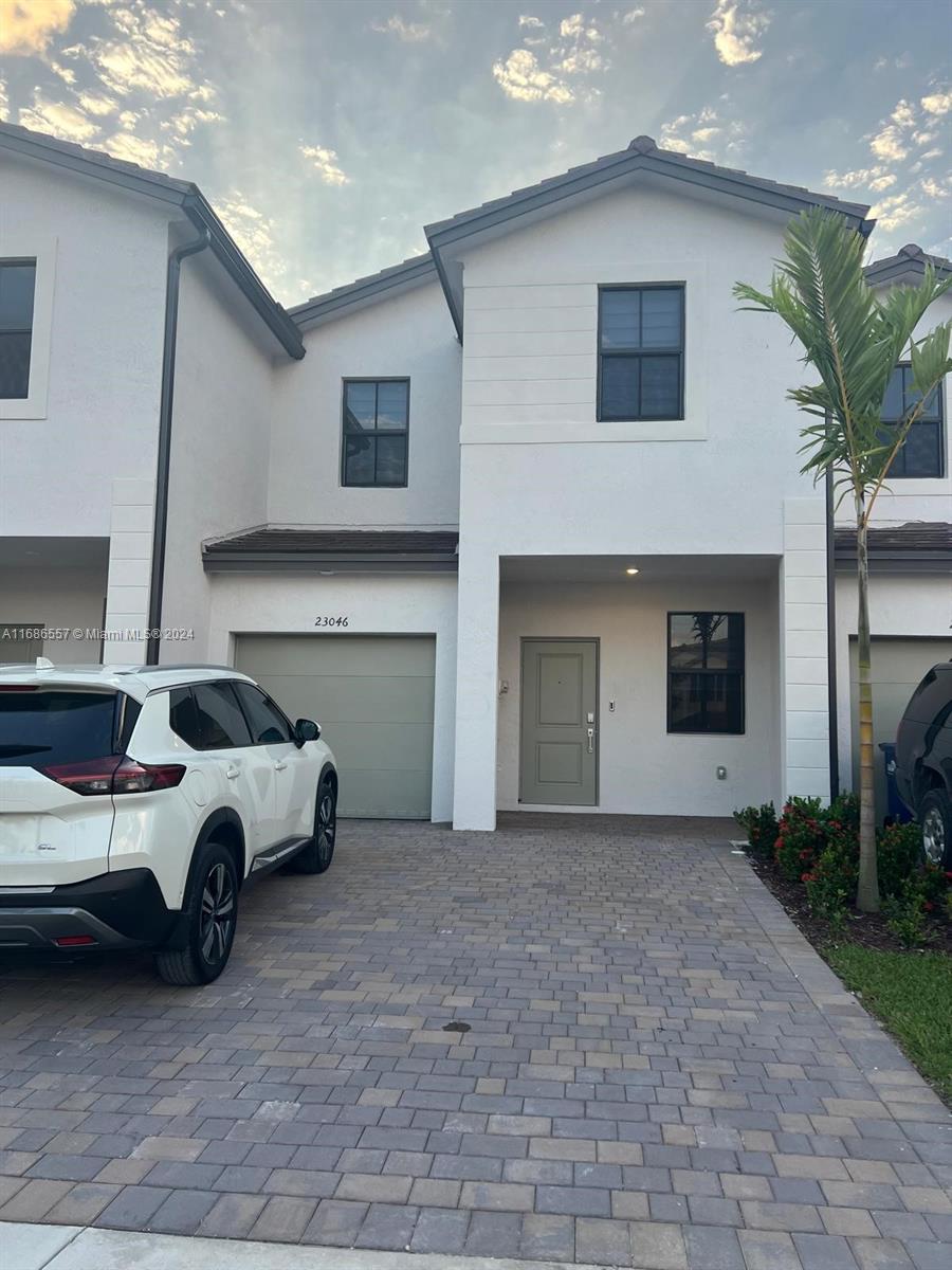 a car parked in front of house