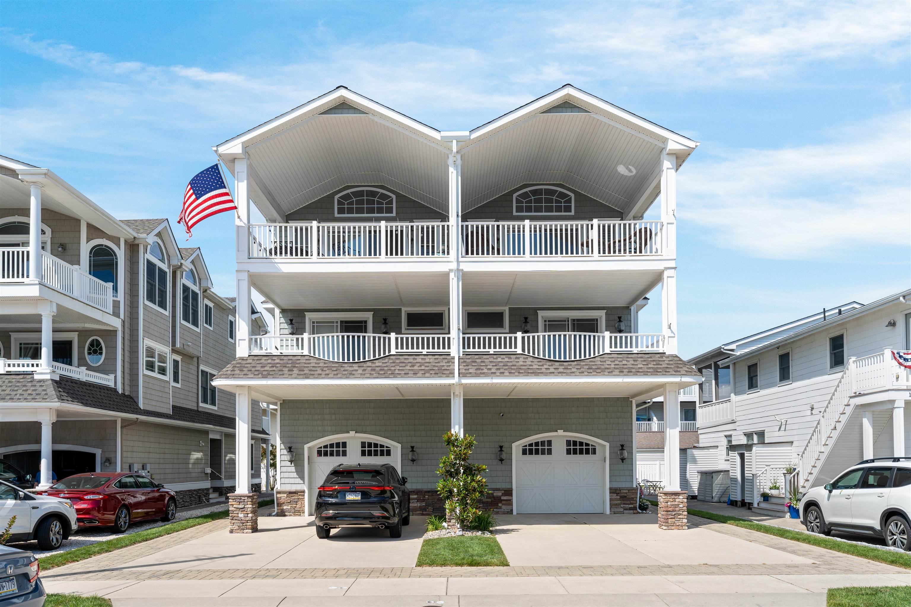 a front view of a building with parking space