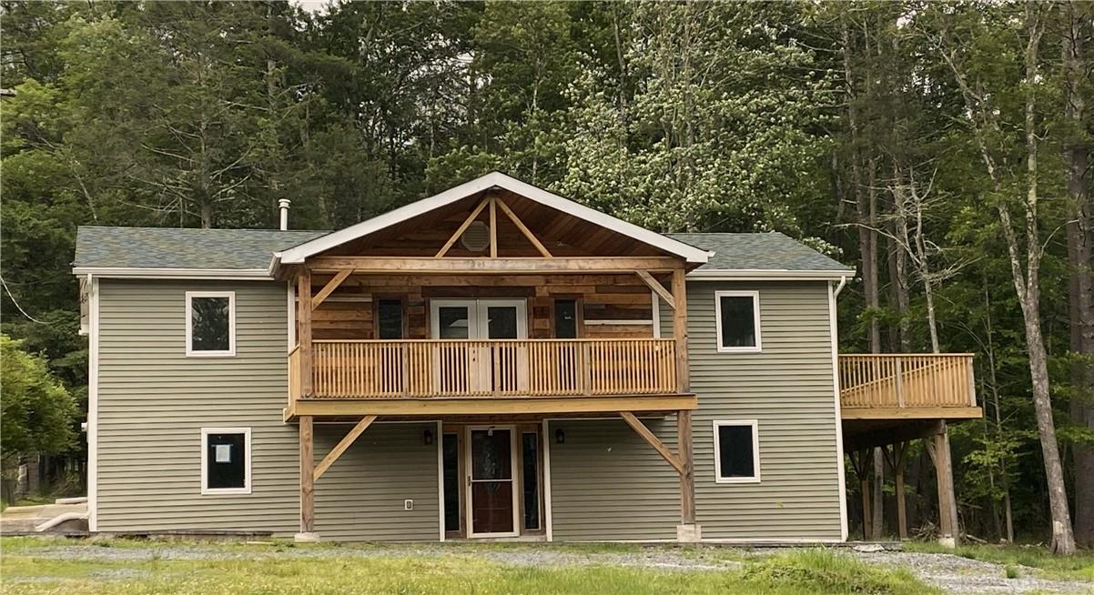 Front view of house with a balcony