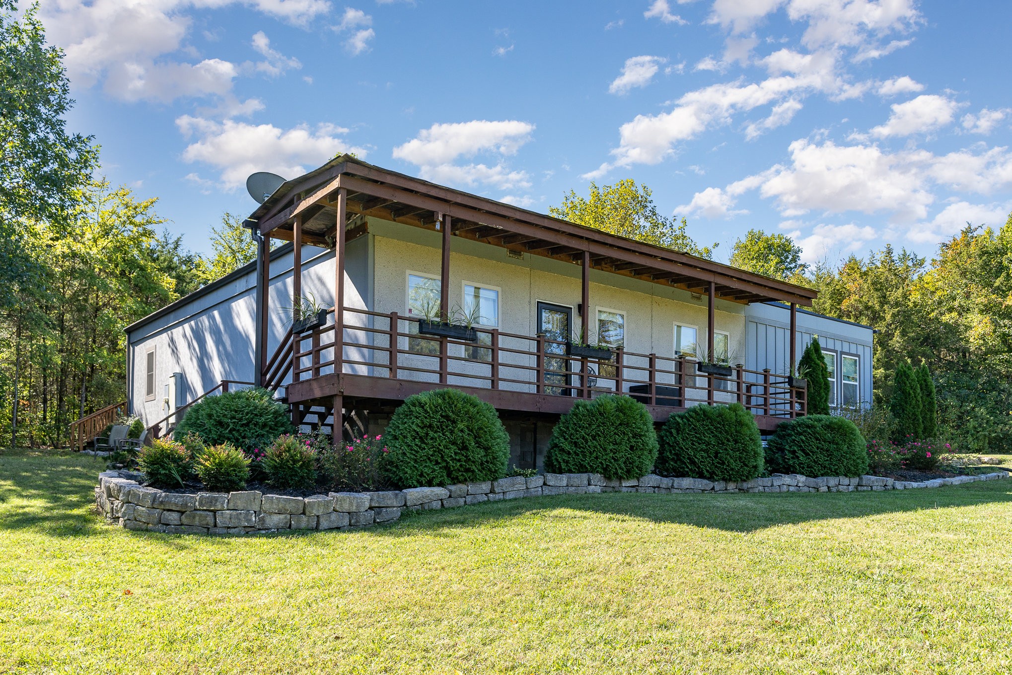 a front view of a house with swimming pool