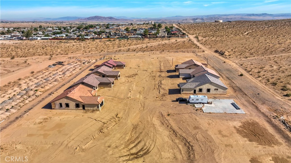 an aerial view of beach and ocean