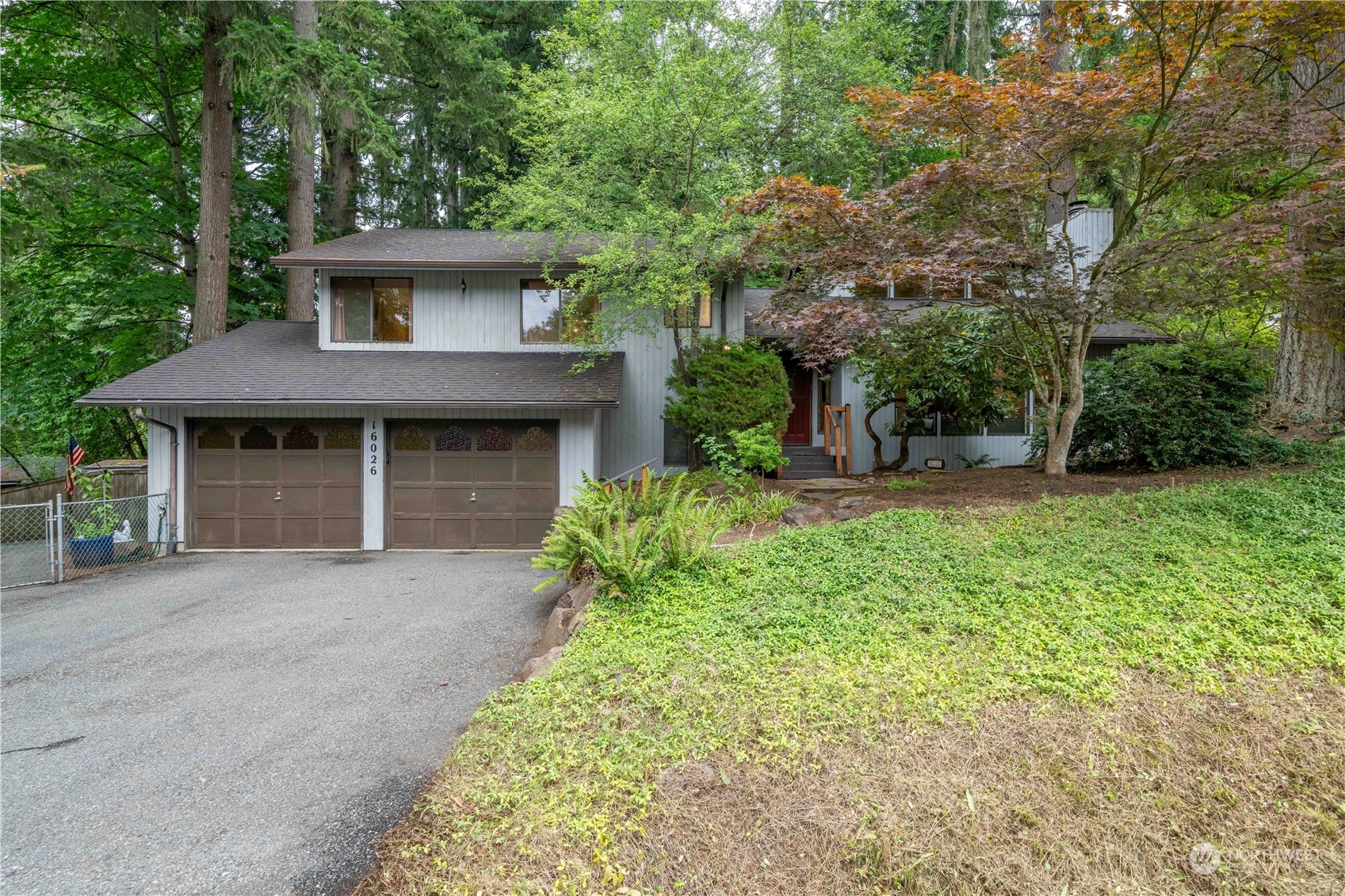 front view of a house with a yard