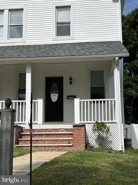 a front view of a house with stairs