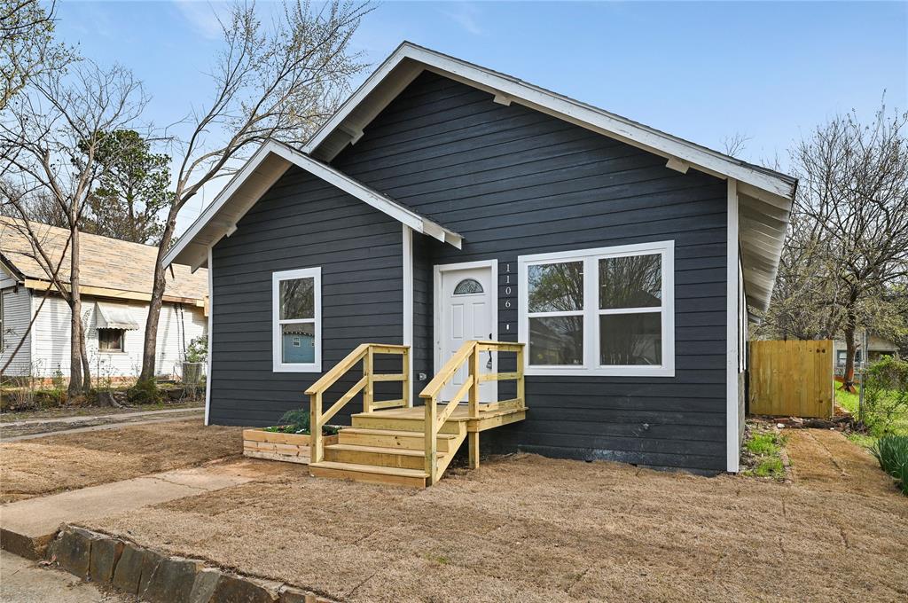 a view of house with outdoor space and porch