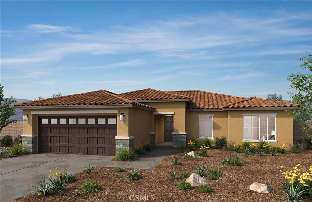 front view of a house with a garden