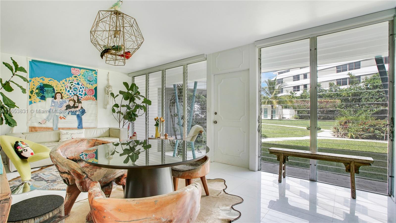 a view of a dining room with furniture window and outside view