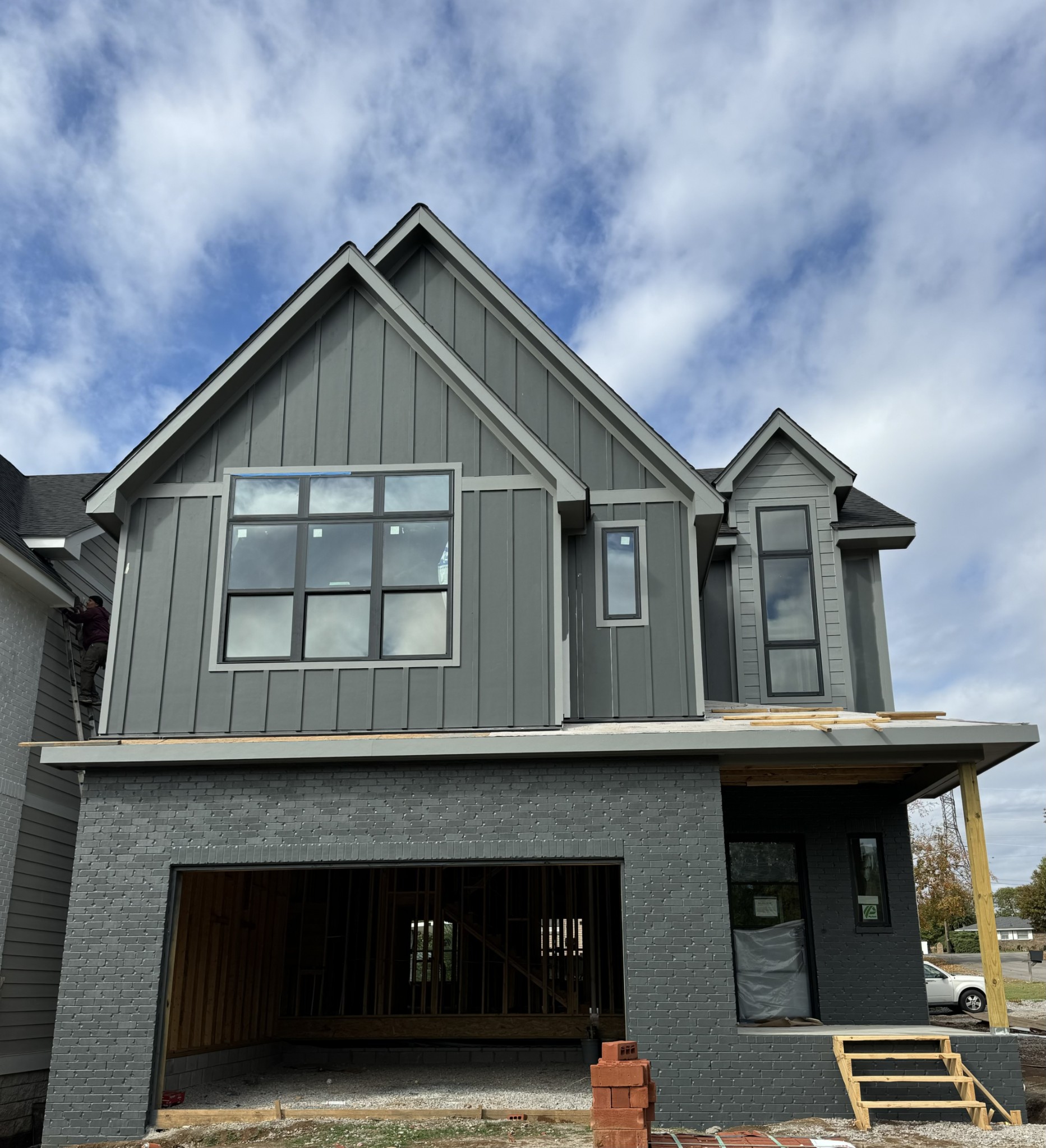 a front view of a house with garage