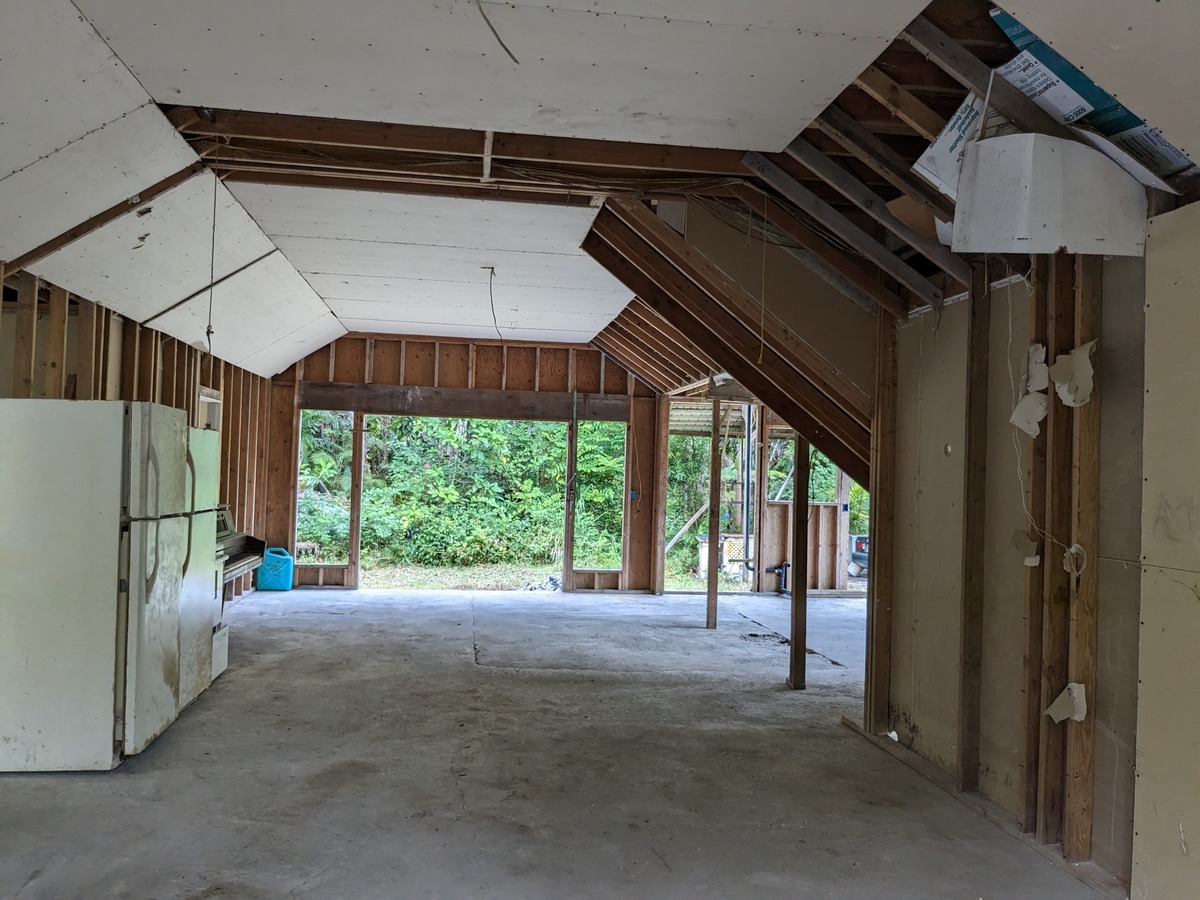 a view of a room with a large window