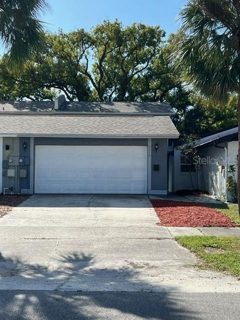 a front view of a house with yard