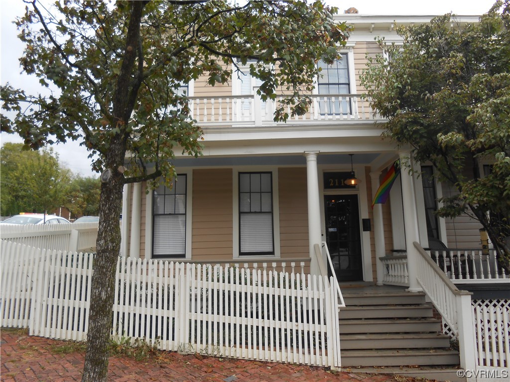 a front view of a house with a porch