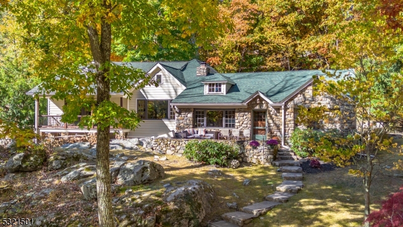 a backyard of a house with yard barbeque oven and outdoor seating