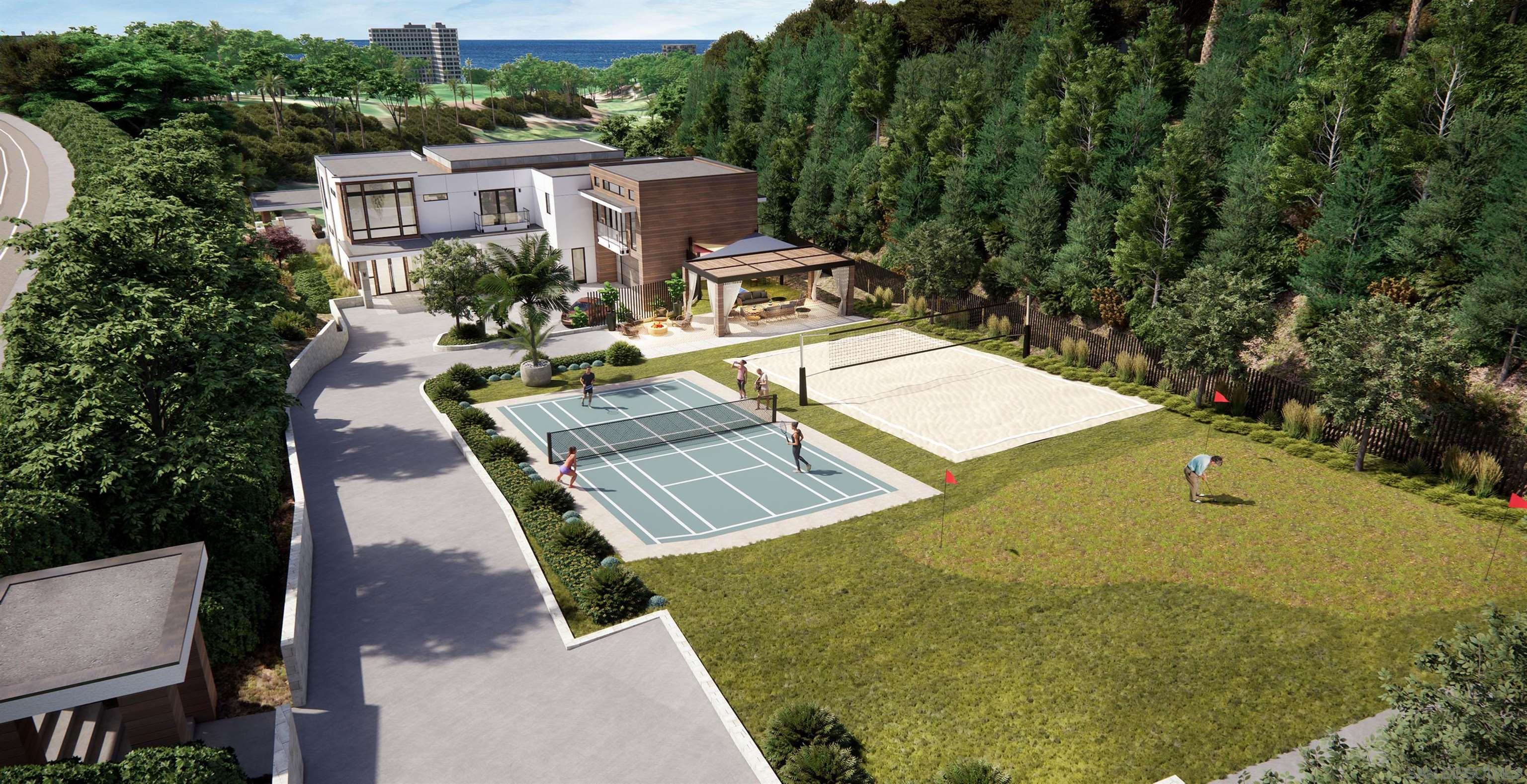 an aerial view of a house with swimming pool and outdoor seating