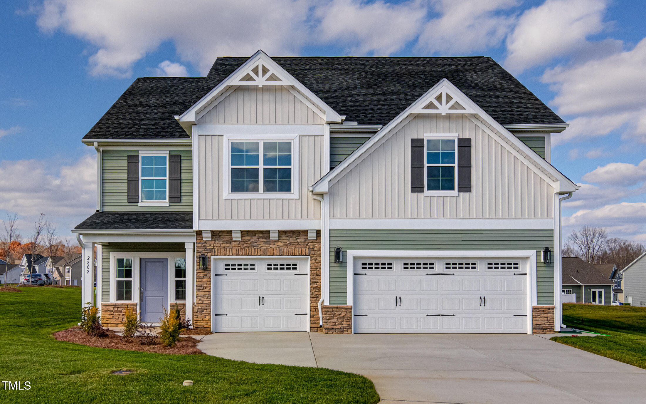 a view of house with yard