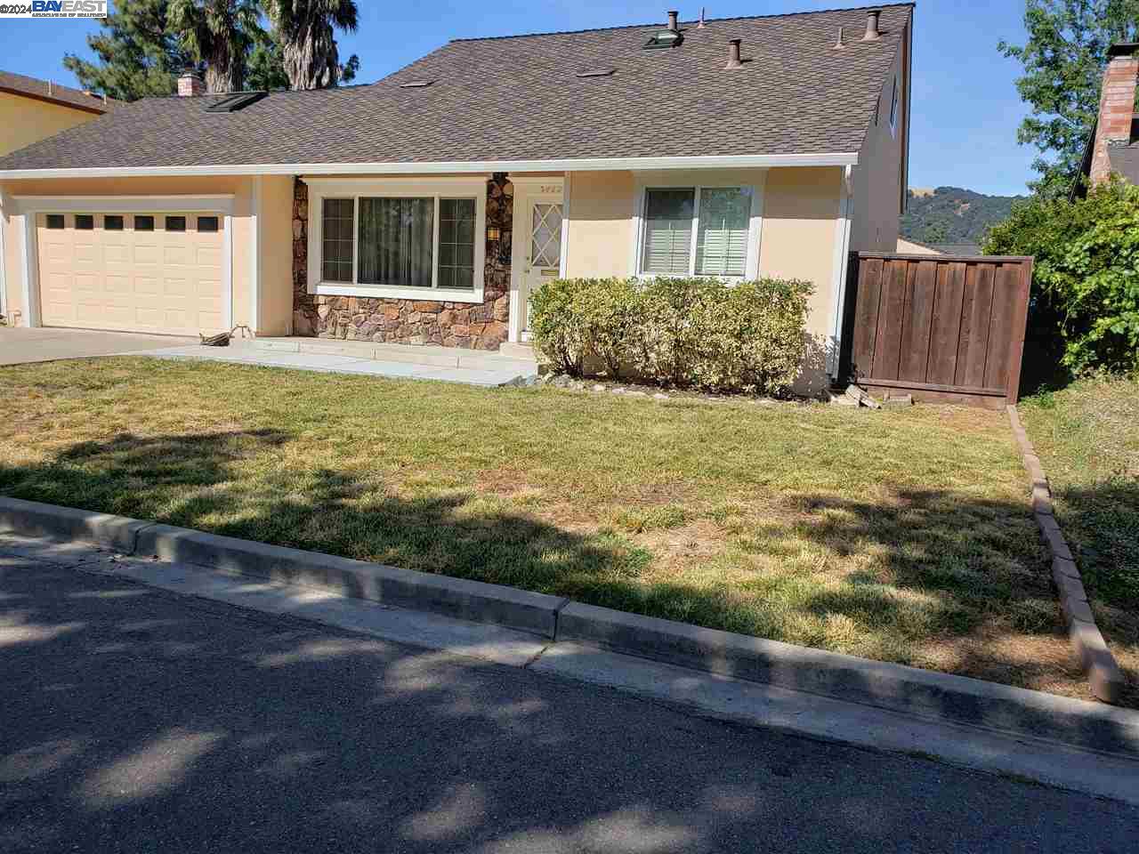 a front view of house with yard