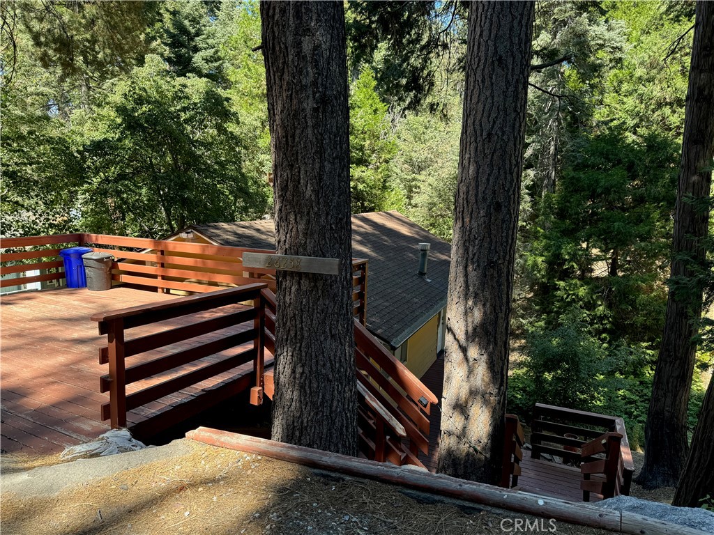 a view of outdoor space deck and tree