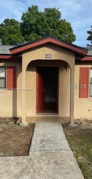 a front view of a house with yard