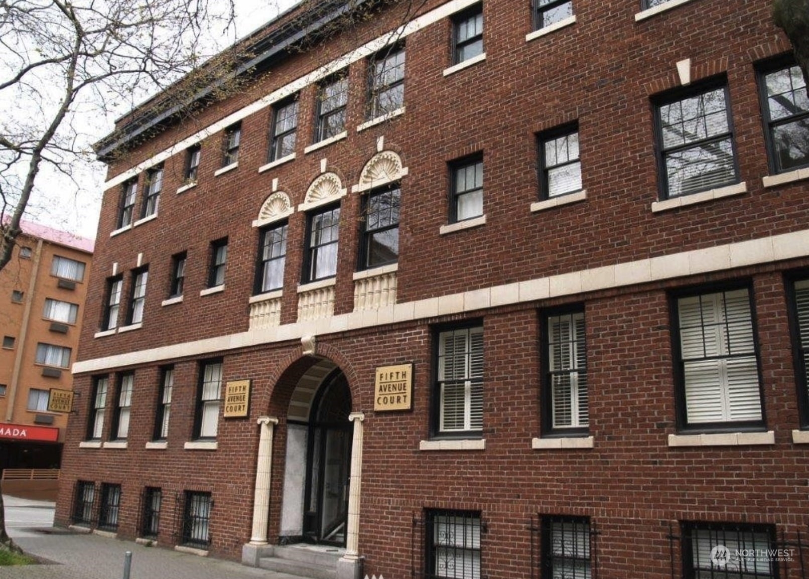 a front view of a building with glass windows